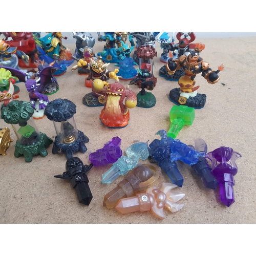 1161 - A collection of console gaming accessories and figures to include Skylanders, Star Wars and Marvel f... 