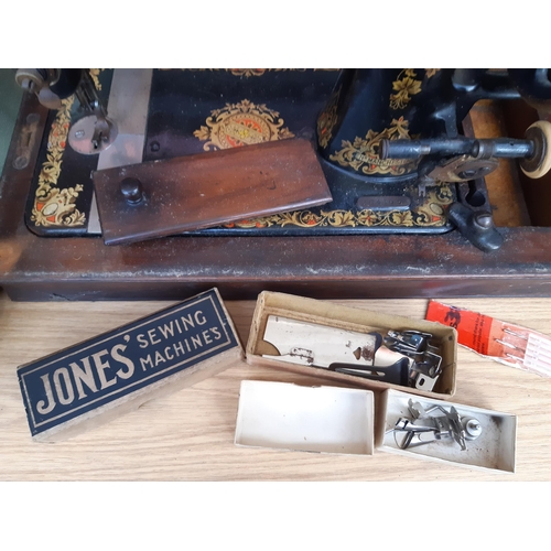 1189 - Two cased sewing machines, one vintage green and cream Bernina Record electric with foot pedal and i... 