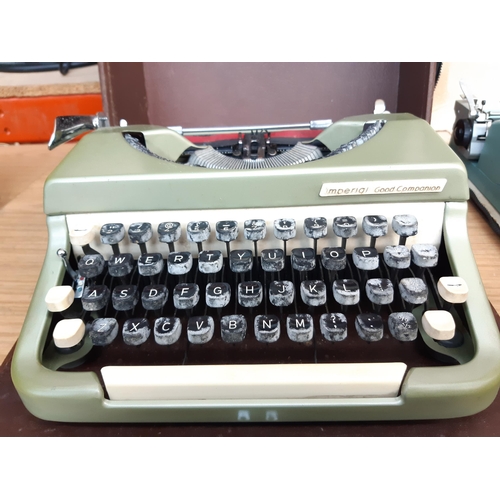 1191 - Four vintage cased portable typewriters, one green Olivetti Lettera 32, one green Halda of Sweden wi... 