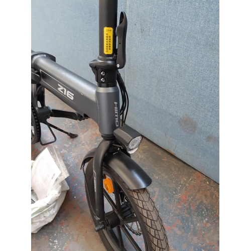 1205 - A Himo Z16 grey and black folding electric bike with twin disc brakes, rear suspension, alloy wheels... 