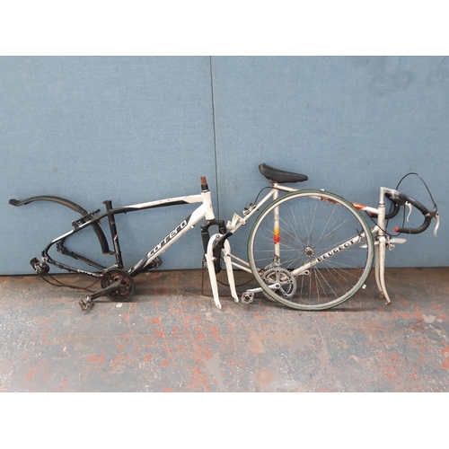 1212 - Three items, one black and white Carrera Crossfire aluminium bicycle frame with front suspension, on... 