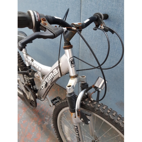 1216 - A grey Optima Cyclone dual suspension mountain bike with eighteen speed Shimano gear system