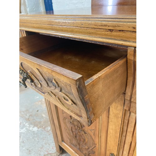 1005A - An Art Nouveau mahogany sideboard with three upper drawers and three lower cupboard drawers - approx... 