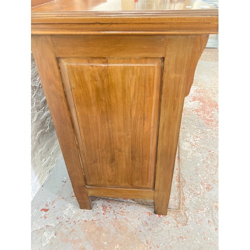 1005A - An Art Nouveau mahogany sideboard with three upper drawers and three lower cupboard drawers - approx... 