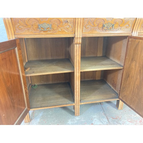 1005A - An Art Nouveau mahogany sideboard with three upper drawers and three lower cupboard drawers - approx... 