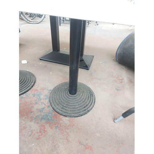 1241B - A marble top bistro/café table on black metal pedestal supports - approx. 77.5cm high x 60cm wide x ... 