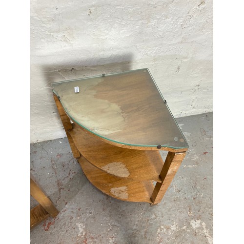 1032A - A vintage walnut serpentine coffee table with glass top and four nesting side tables with glass tops... 