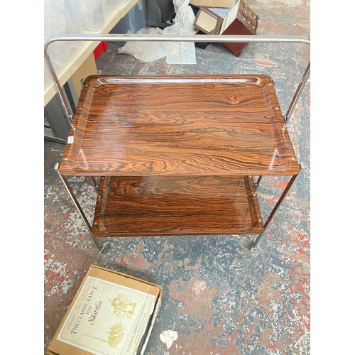 1461A - Three items, mid 20th century rosewood effect melamine and chrome two tier tea trolley, modern pine ... 