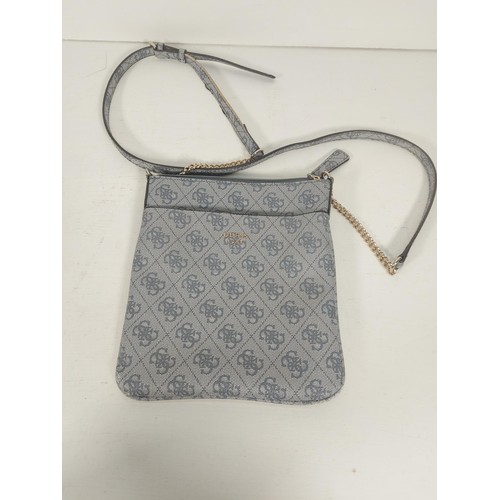 331C - Nine designer ladies handbags to include Radley, Guess, Michael Kors, Fossil, Mantaray etc.