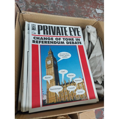 1465 - Three boxes containing a large quantity of Private Eye magazines