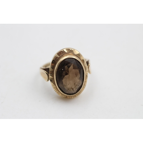 23 - A hallmarked Birmingham 9ct gold smoky quartz dress ring, size L - approx. gross weight 4.6 grams