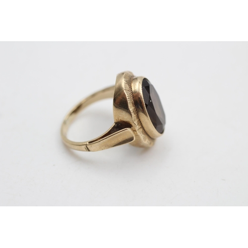 23 - A hallmarked Birmingham 9ct gold smoky quartz dress ring, size L - approx. gross weight 4.6 grams