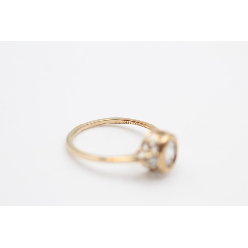 33 - A 9ct gold zircon trilogy dress ring, size Q - approx. gross weight 2 grams