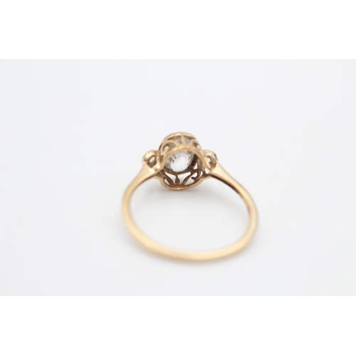 33 - A 9ct gold zircon trilogy dress ring, size Q - approx. gross weight 2 grams