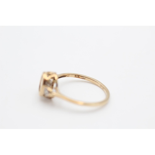 33 - A 9ct gold zircon trilogy dress ring, size Q - approx. gross weight 2 grams