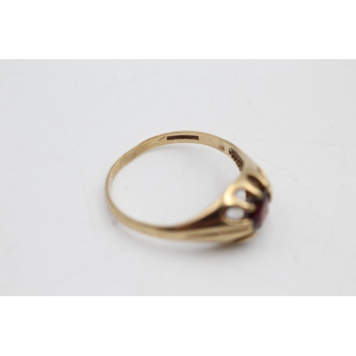 13 - Two 9ct gold garnet dress rings, one buttercup solitaire, size T and one cluster, size P½ - approx. ... 