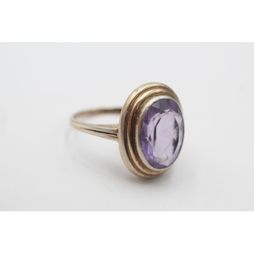 20 - A 14ct gold amethyst cocktail ring, size R - approx. gross weight 4.3 grams