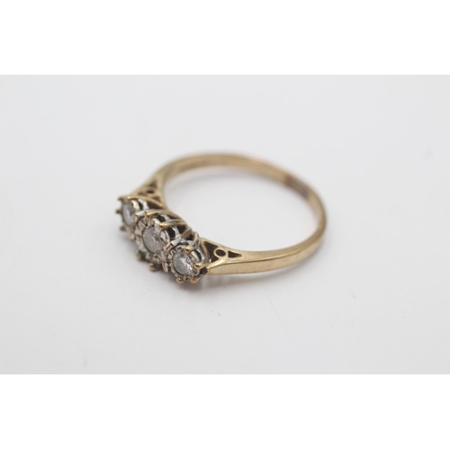 24 - A hallmarked Sheffield 9ct gold diamond three stone illusion setting ring, size M - approx. gross we... 