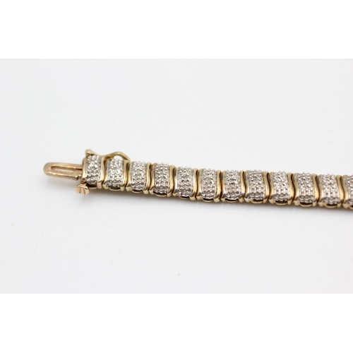 26 - A 9ct gold diamond set tennis bracelet - approx. gross weight 8.7 grams