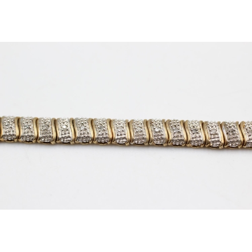 26 - A 9ct gold diamond set tennis bracelet - approx. gross weight 8.7 grams