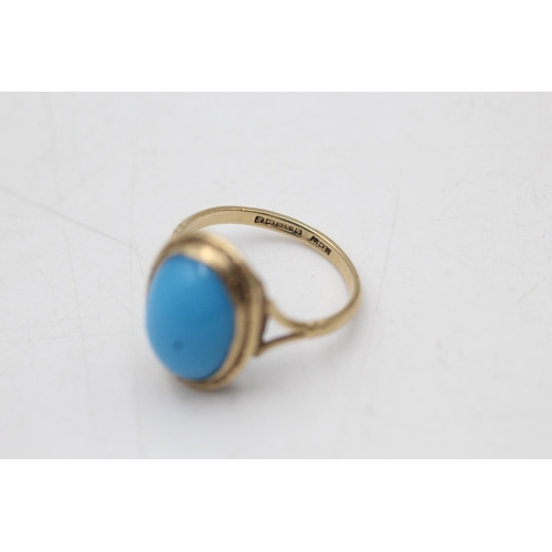 27 - A 9ct gold blue cabochon engraved detail dress ring, size M½ - approx. gross weight 3 grams