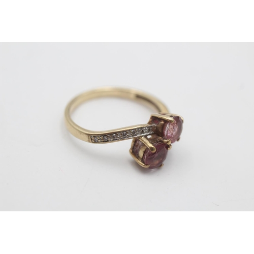 3 - A hallmarked Birmingham 9ct gold purple gemstone and diamond toi et moi ring, size O - approx. gross... 