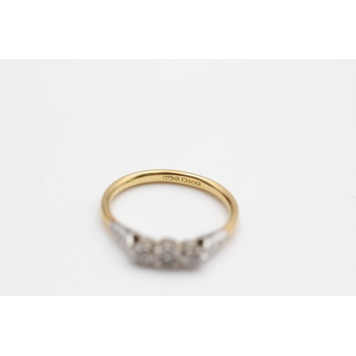 41 - An 18ct gold and platinum diamond trilogy ring, size M - approx. gross weight 2.2 grams