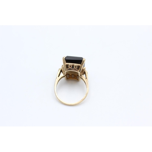 6 - A mid 20th century 10ct gold smoky quartz cocktail ring, size L½ - approx. gross weight 5.9 grams