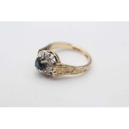 61 - A 9ct gold sapphire and diamond halo ring with star design shoulders, size J½ - approx. gross weight... 