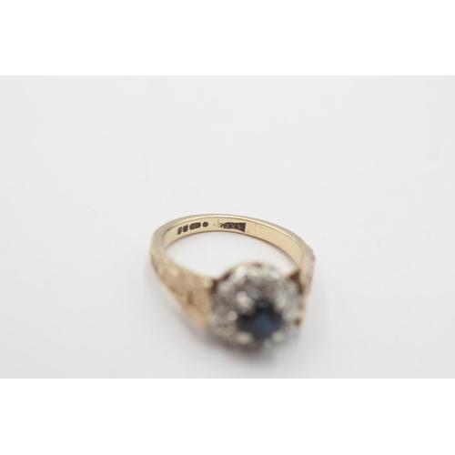 61 - A 9ct gold sapphire and diamond halo ring with star design shoulders, size J½ - approx. gross weight... 