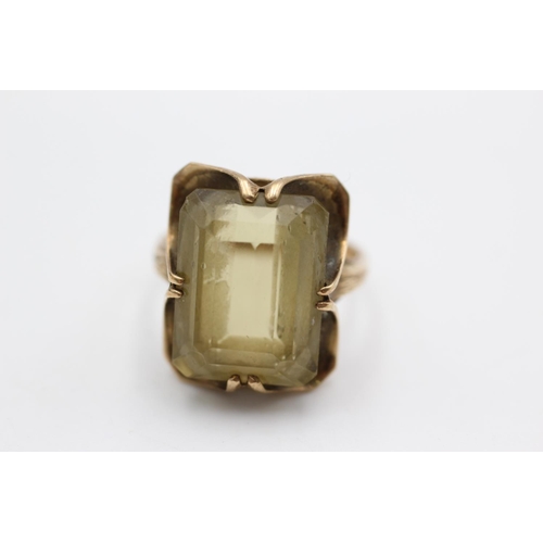 66 - A 9ct gold citrine solitaire buttercup setting cocktail ring, size O - approx. gross weight 6 grams