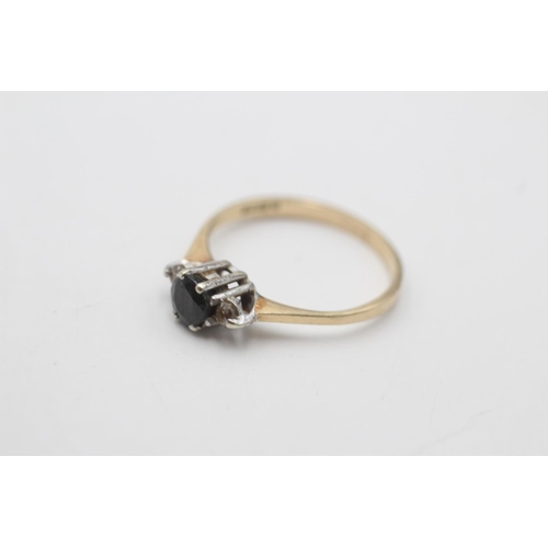 69 - A 9ct gold sapphire and diamond shouldered ring, size L - approx. gross weight 1.4 grams