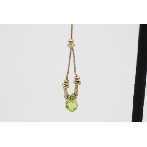 74 - A pair of 9ct gold gemstone chain drop stud earrings - approx. gross weight 2.6 grams