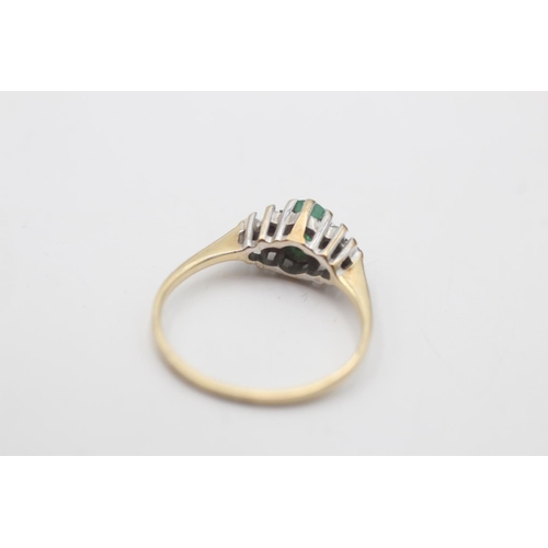 84 - A 9ct gold emerald and diamond cluster ring, size L - approx. gross weight 1.5 grams