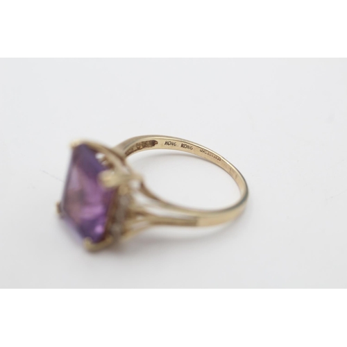 88 - A 9ct gold amethyst gemstone shouldered cocktail ring, size O½ - approx. gross weight 3.6 grams