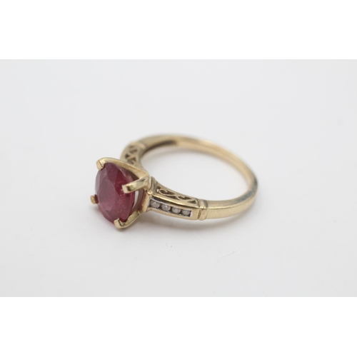 95 - A 9ct gold ruby and diamond dress ring, size N½ - approx. gross weight 3.5 grams