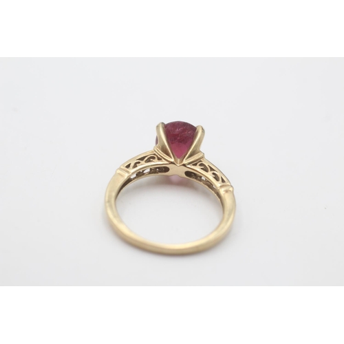 95 - A 9ct gold ruby and diamond dress ring, size N½ - approx. gross weight 3.5 grams