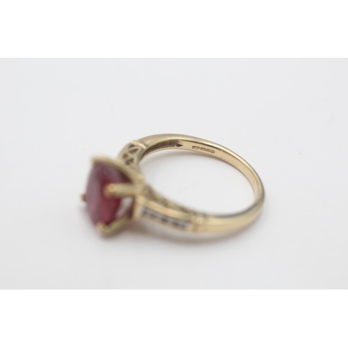 95 - A 9ct gold ruby and diamond dress ring, size N½ - approx. gross weight 3.5 grams