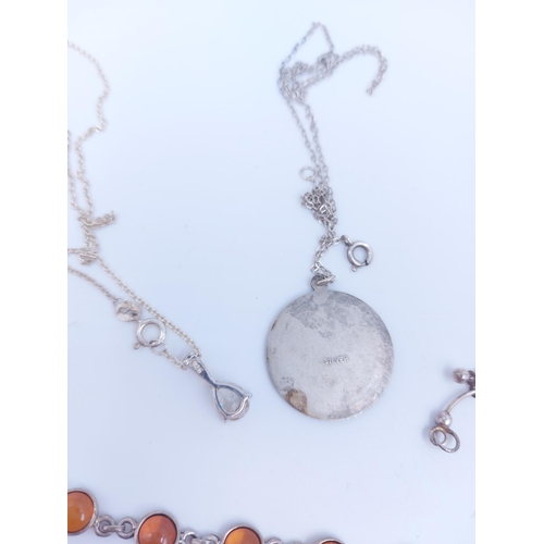 115 - A collection of various .925 sterling silver jewellery to include amber bracelet, letter 'M' pendant... 