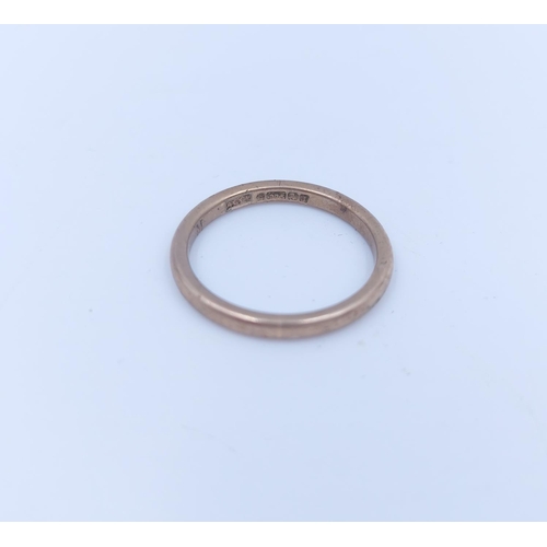 117 - A hallmarked Birmingham 9ct gold wedding band, size M and dated 1933 - approx. gross weight 2 grams