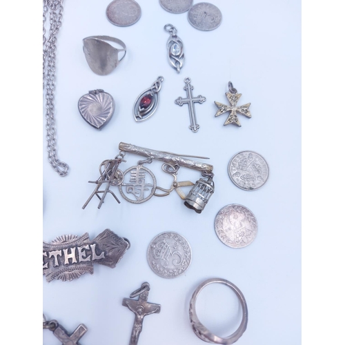 103 - A collection of various silver coins and jewellery to include hallmarked sterling silver albert chai... 