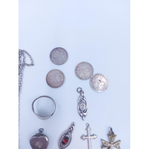 103 - A collection of various silver coins and jewellery to include hallmarked sterling silver albert chai... 