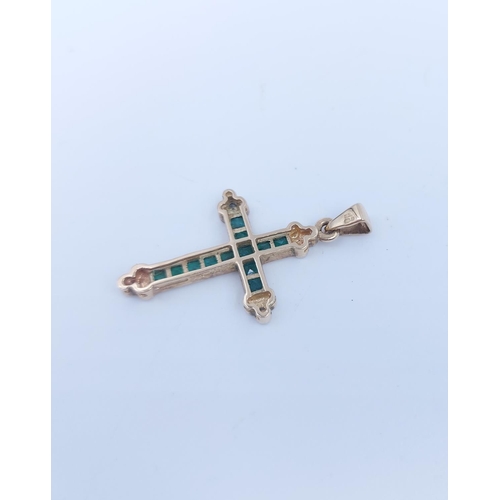 105A - Four items of 9ct gold and gemstone jewellery, one emerald and diamond cross pendant - approx. gross... 