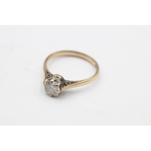 10 - A 9ct gold clear gemstone solitaire ring, size N½ - approx. gross weight 2 grams