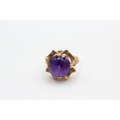 101 - A hallmarked London 9ct gold amethyst cocktail ring, size M½ - approx. gross weight 4.6 grams