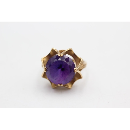 101 - A hallmarked London 9ct gold amethyst cocktail ring, size M½ - approx. gross weight 4.6 grams