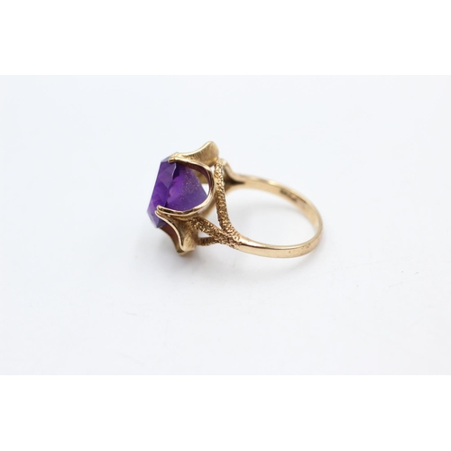 101 - A hallmarked London 9ct gold amethyst cocktail ring, size M½ - approx. gross weight 4.6 grams