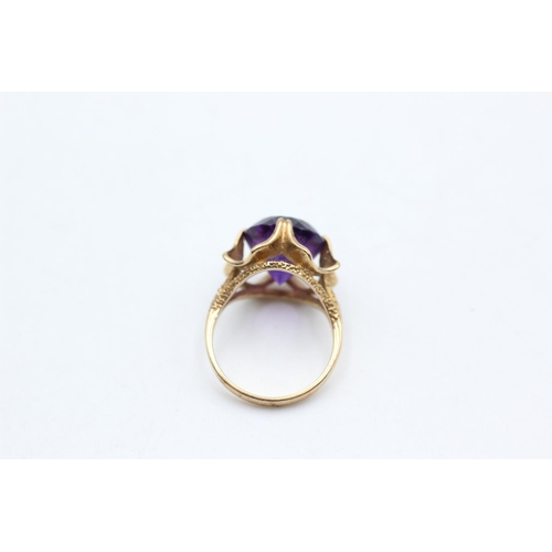 101 - A hallmarked London 9ct gold amethyst cocktail ring, size M½ - approx. gross weight 4.6 grams