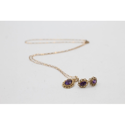 104 - A 9ct gold amethyst bordered solitaire stud earrings and pendant necklace set - approx. gross weight... 