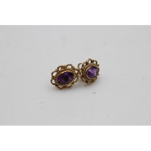 104 - A 9ct gold amethyst bordered solitaire stud earrings and pendant necklace set - approx. gross weight... 